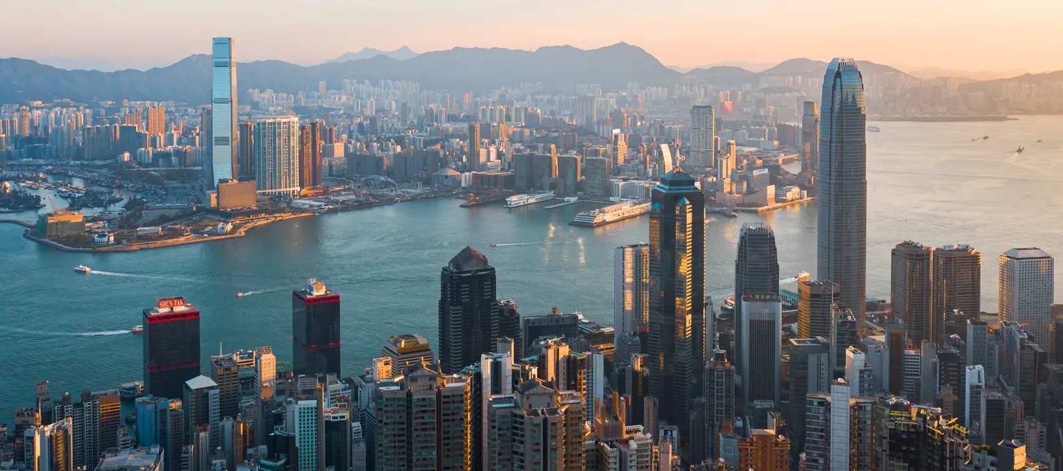 Harbour skyline at sunrise seen from the hills